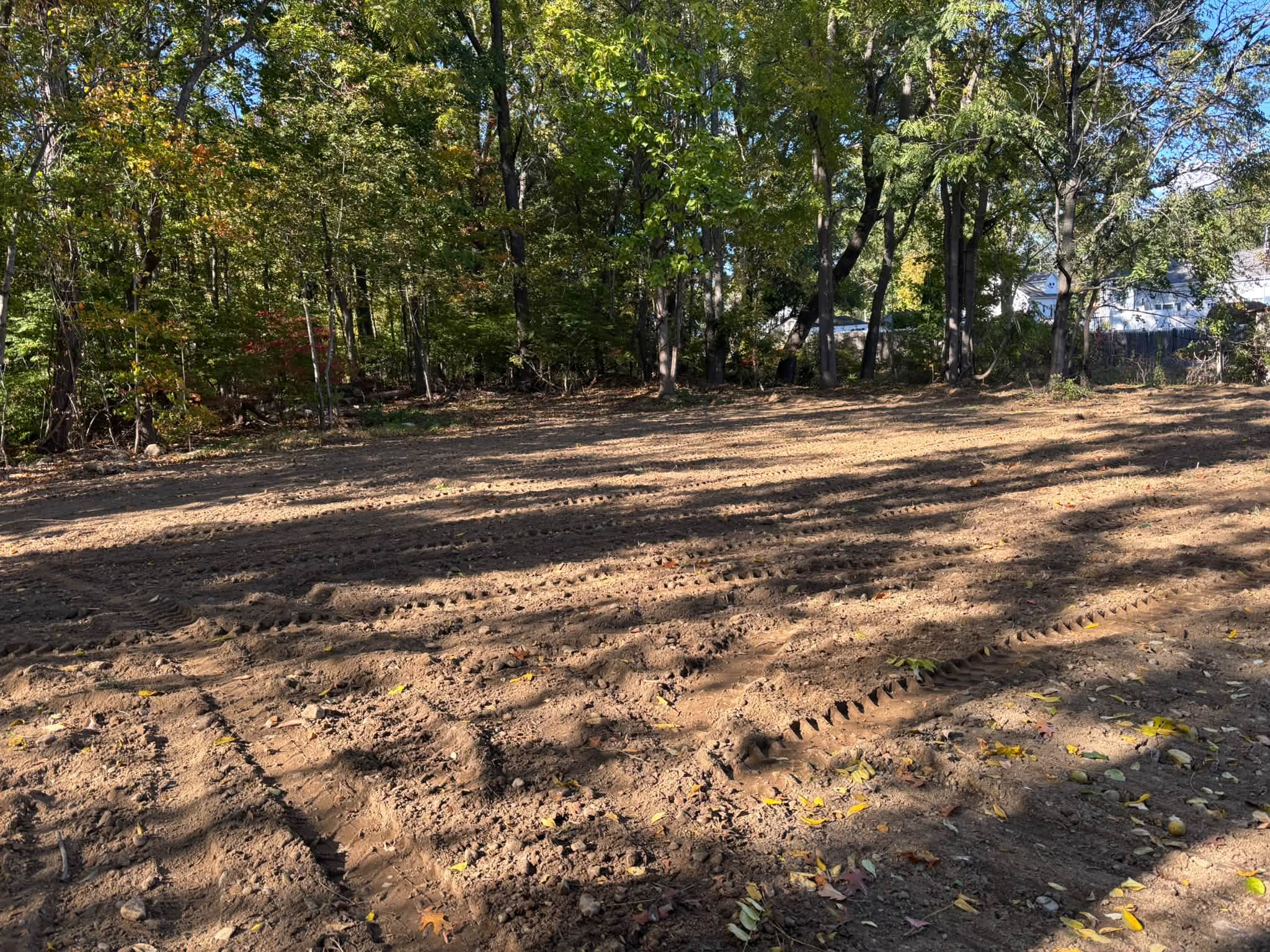 Smooth finished grade after regrading — Auburn, MA